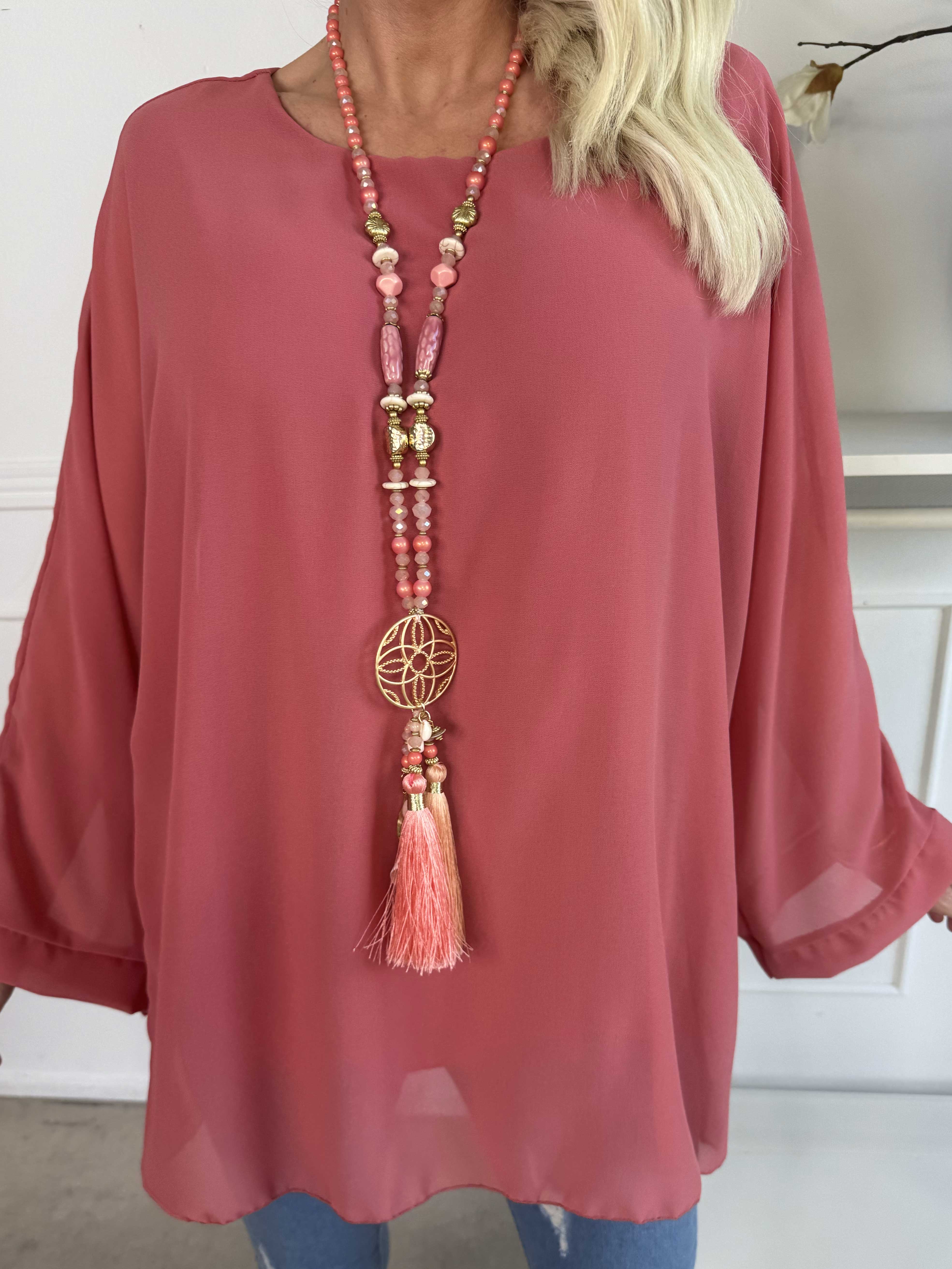 Flores - Tunika med chiffonglager och halvgenomskinliga ärmar